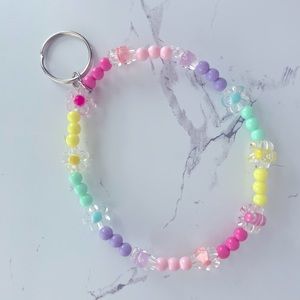 Super cute pretty flower beaded key chain holder. (Does not come with wallet).